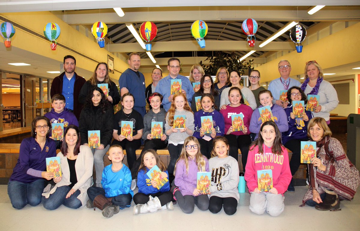 What a great turnout - Middle school student stop for a photo at UMMS’s Project Lit Club. Join  us Feb. 28th where they will discuss “Ghost” by Jason Reynolds. <a href="/LitUmms/">UMMSProjectLIT</a>