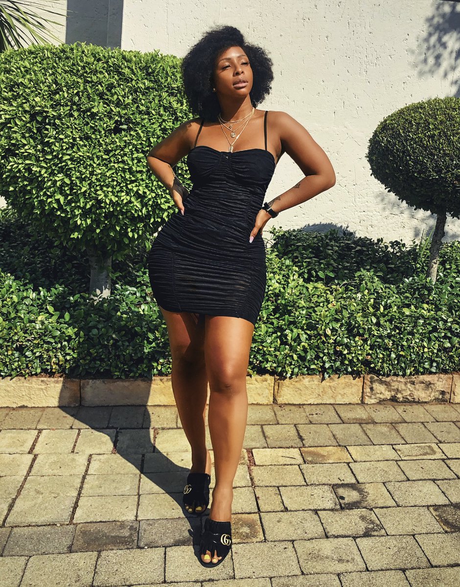 Boity's tweet photo. Sun kissed in the perfect LBD. 😍❤️👑 https://t.co/OkcnnaT9AP