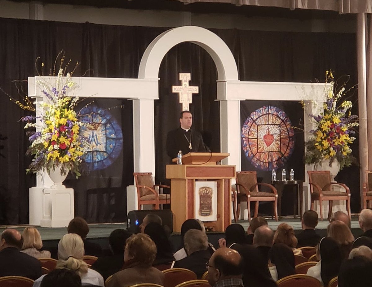RohnDesign's tweet photo. Sharing these inspiring photos from the opening speeches of #SouthwestLiturgicalConference. We are thrilled they chose images of windows we designed for @CoCathedral as a backdrop for the kick-off to this energizing #studyweek2019 #beautyandtheliturgy #catholic @SWLCRegion10_13 https://t.co/nU4MRRCeE1
