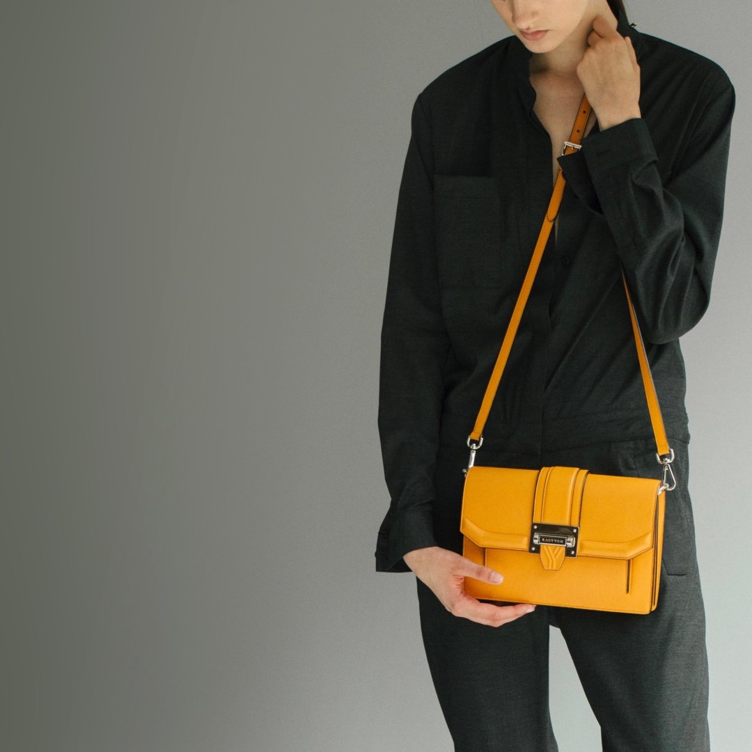 A pop of color can style up any plain look. What's your favorite pop of color from our collection?

#KACYYOM #leathercrossbody #goldhandbag #popofcolor #seattlestyle