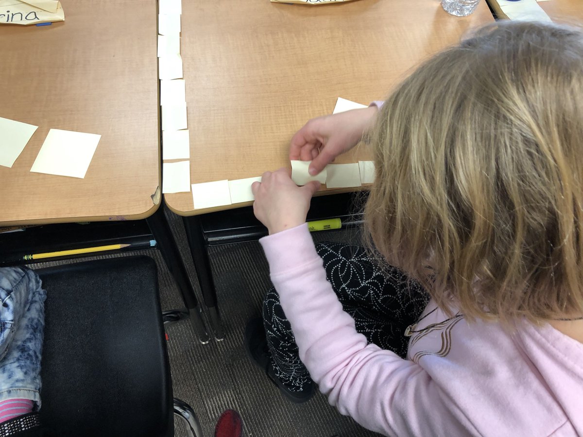 Mrs_Moore4's tweet photo. Exploring area this week! Trying to calculate the area of our desks with only the handful of post-its we've been given. Lots of great thinking going on! @ElsaEngRRISD @EMathRRISD https://t.co/gnzZ10QEF1