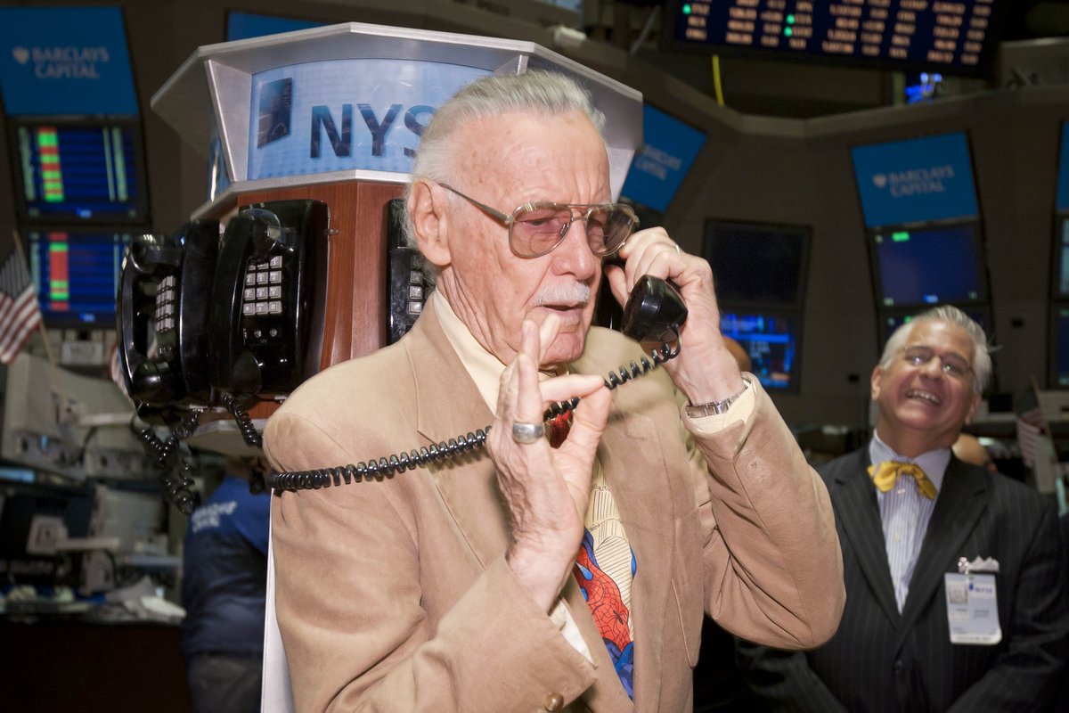 TheRealStanLee's tweet image. #tbt to Stan calling the shots on the floor of the New York Stock Exchange in 2010 – in his Spidey tie and Hulk hands, no less!