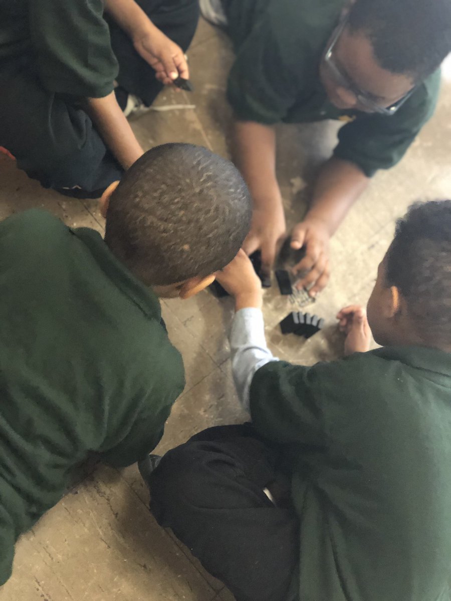GonzalezESCS's tweet photo. My kindergarten engineers are hard at work building a system using dominoes. @SchoolEastside #stem #pushpullgo #science #Kindergarten #WatchUsWork #ChartersWork #EastsideCharterSchool https://t.co/qd8zgDcSvY