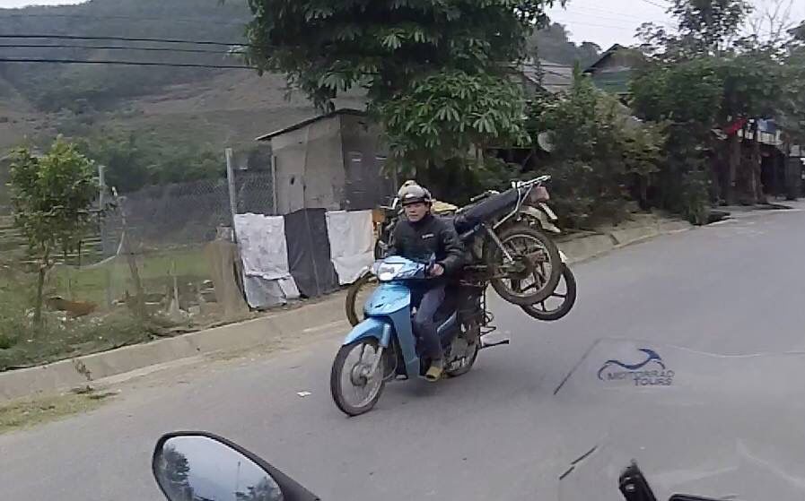 MotorradTours's tweet photo. “Is there a breakdown recovery service in Vietnam?”   Yep, sure is!  #motorradtours #scootersforeverything #bmwmotorrad #bikesofburden #vietnam #makelifearide https://t.co/VCnk8DPJOH