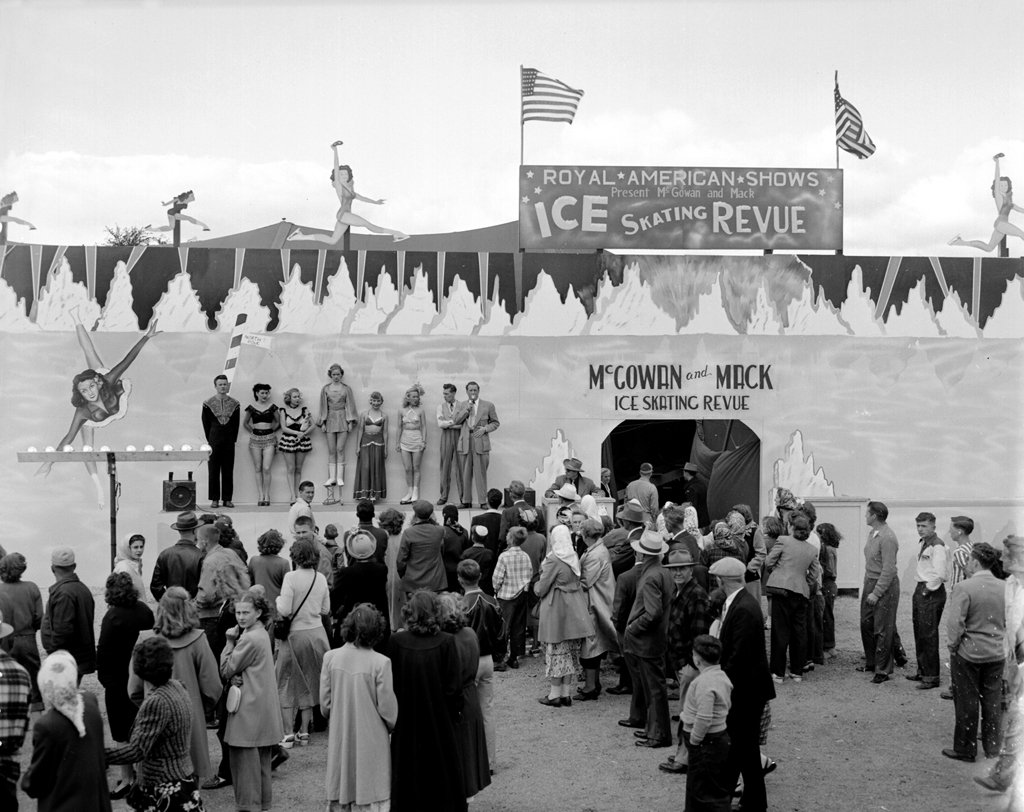mnstatefair's tweet photo. Ice skating in the summer? For one year in 1949, there was a McGowan & Mack Ice Skating Revue held on the carnival midway at the fair! #ThrowbackThursday #FairPhotoMemory https://t.co/bz9lV7x0FC