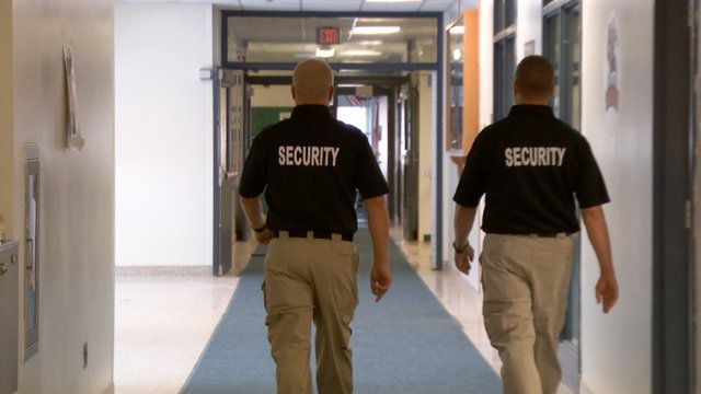 Armed security officers patrolling Liverpool NY School District