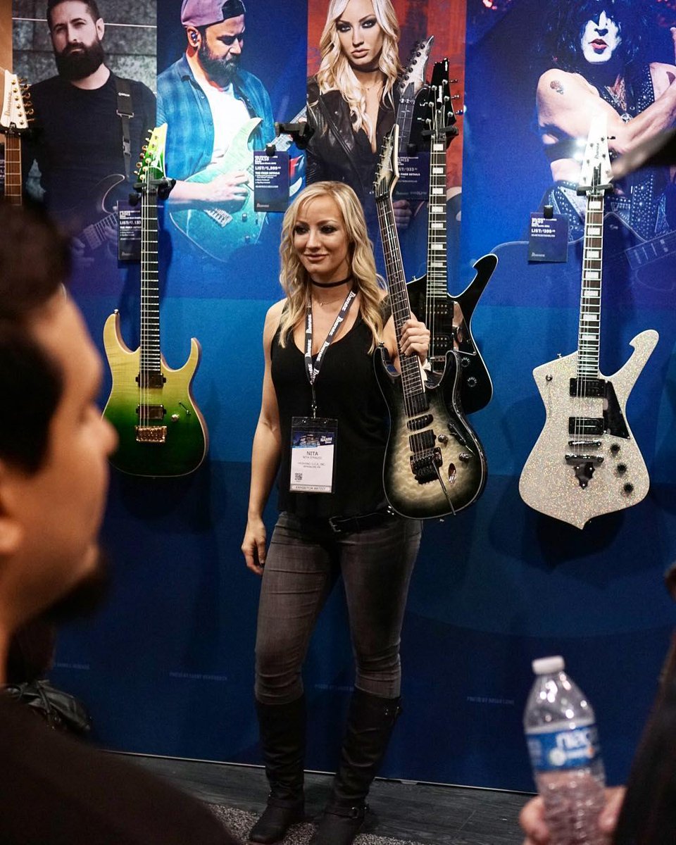 AmericanMusical's tweet photo. @hurricanenita  showing off her signature guitar from @ibanezofficial!

Get yours today - https://t.co/BBBnuVvOO8

Check out all new for NAMM gear at https://t.co/h34RIHtLRL

-----
#NAMM2019 #NewForNAMM
@NAMM https://t.co/IMkPfpq0dS