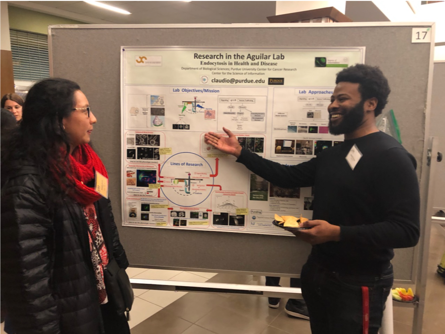 Purdue_AguiLAB's tweet photo. McKeith Pearson presents some very cool projects being conducted in the Aguilar Lab to new graduate recruits! #biopurdue #gradlife #interviewweekend #PurdueCMB @PurdueCellMol @PurdueScience @PurdueBiolSci https://t.co/sv7OIM0iL7