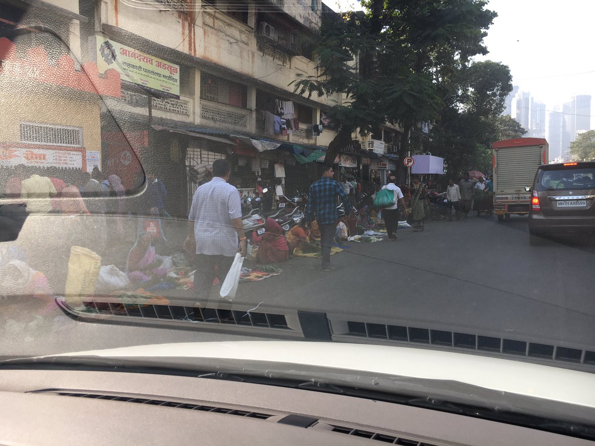 kurnal's tweet photo. @MCGMswm you guys have to do something about vendors sitting on the road after Dadar bridge on tulsi pipe road and blocking the whole morning traffic. https://t.co/67QCdbLim0