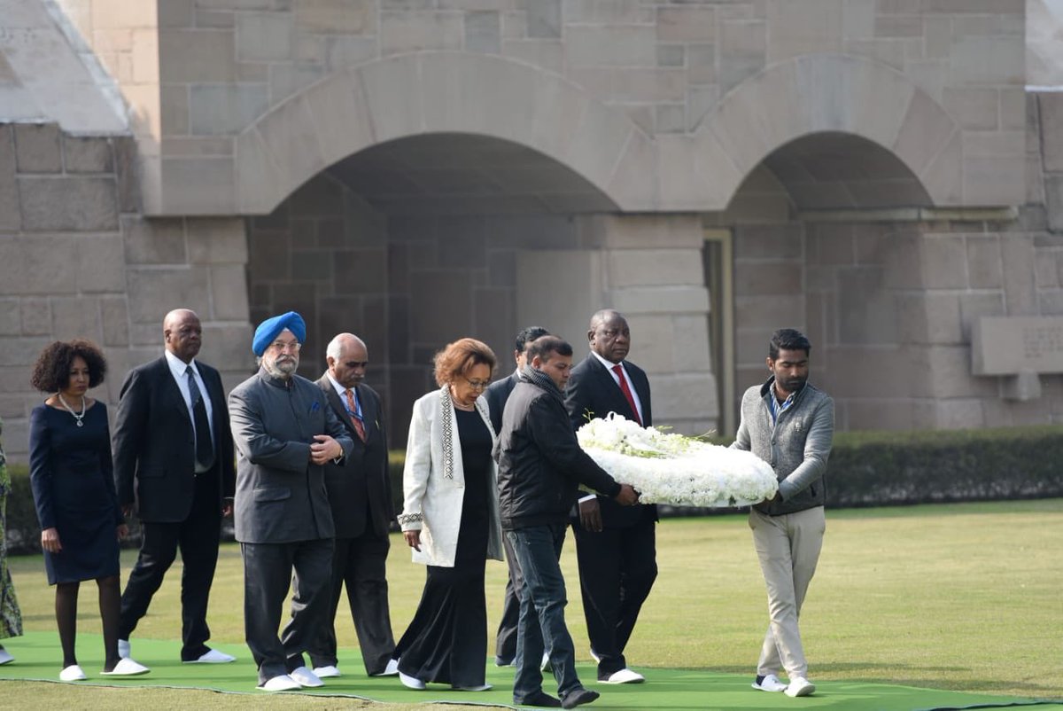 DIRCO_ZA's tweet photo. President Cyril Ramaphosa lays a wreath at the Mahatma Gandhi Memorial in New Delhi, India on the occasion of a State Visit at the invitation of Prime Minister Narendra Modi. #SAIndiaRelations #RepublicDay2019 https://t.co/CMLYHoBzsi