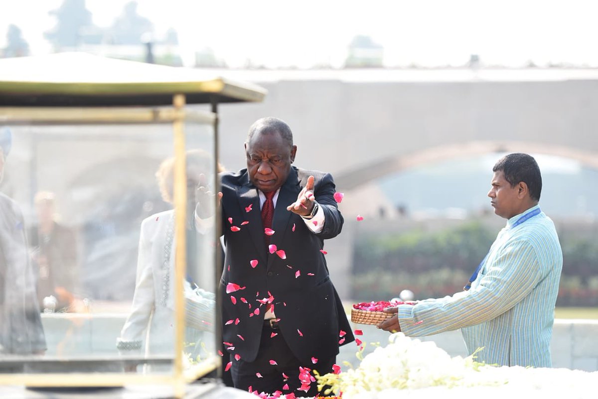 DIRCO_ZA's tweet photo. President Cyril Ramaphosa lays a wreath at the Mahatma Gandhi Memorial in New Delhi, India on the occasion of a State Visit at the invitation of Prime Minister Narendra Modi. #SAIndiaRelations #RepublicDay2019 https://t.co/CMLYHoBzsi