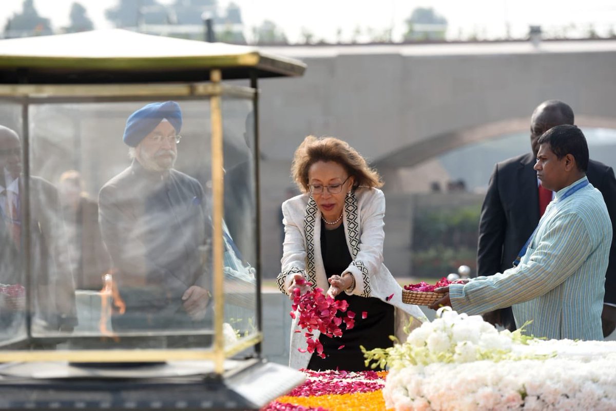 DIRCO_ZA's tweet photo. President Cyril Ramaphosa lays a wreath at the Mahatma Gandhi Memorial in New Delhi, India on the occasion of a State Visit at the invitation of Prime Minister Narendra Modi. #SAIndiaRelations #RepublicDay2019 https://t.co/CMLYHoBzsi