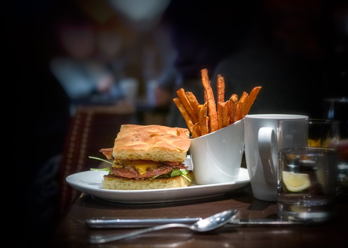 Fresh from the farm, our Joyce Farms Fried Chicken Sandwich oozes with cheddar cheese, bacon, arugula, house pickles, and turns up the heat with homemade jalapeño aioli. With a side of sweet potato fries - your mouth should be watering.