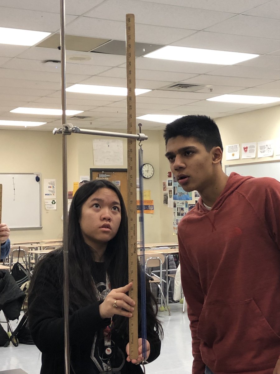 DKFizx's tweet photo. AP Physics 1 student practice precise measuring techniques during the Stretch the Spring Lab.  #BHSPhysics #BHSScience @jbaylor77 @BarringtonHS220 https://t.co/t0x8ib7RyH