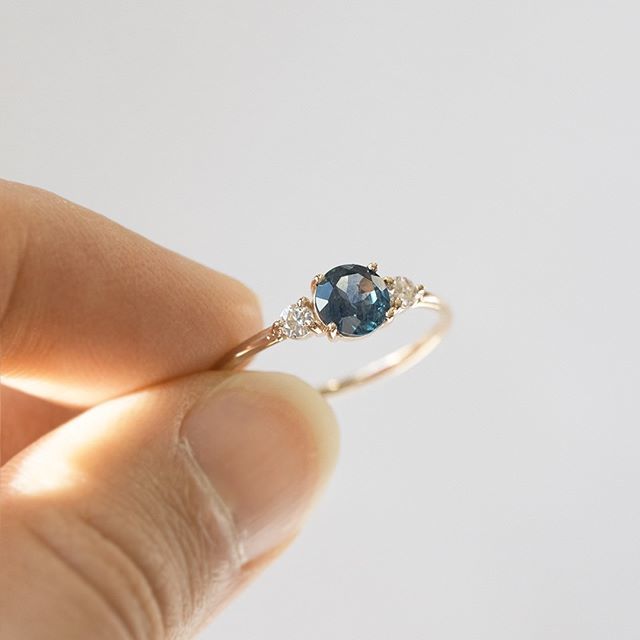 agildedleaf's tweet photo. She reached out to us early in the year, asking for a custom piece to be done with a Montana Sapphire. After sending pictures back and forth, we were able to find one for her - one with a beautiful ocean-green/blue hue to it! 💙 We're truly thankful f… https://t.co/kmJb0ZDpYN https://t.co/DRHkqYG7aX