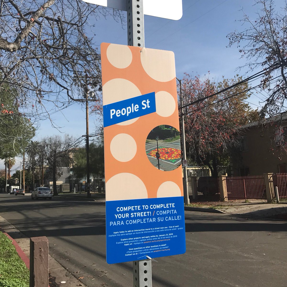 LADOTPeopleSt's tweet photo. Have you spotted these signs in your neighborhood? They are located near streets that are eligible for People St projects - intersection murals, decorative crosswalks, bike corrals + more! 

Less than a week left to apply. Email us at peoplest@lacity.org. https://t.co/WLK0VfXmty