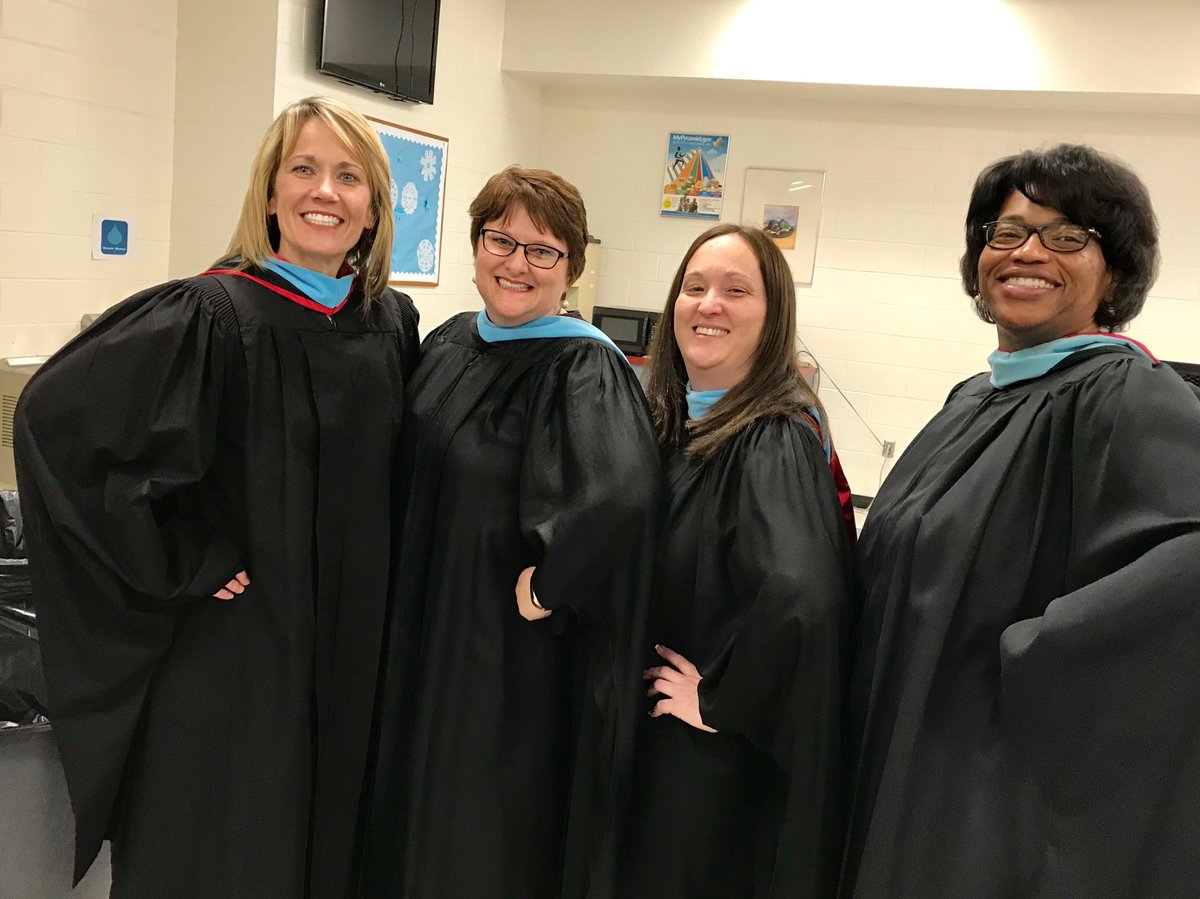 Our amazing High School Principals robed and ready for Winter Graduation
