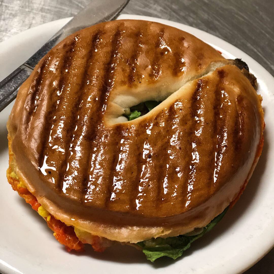 AmadeusCaffe's tweet photo. Have you tried our new vegan breakfast panini? They are super delicious, healthy and 100% vegan! The panini includes tofu scramble, grilled eggplant, red pepper spread, vegetables and organic greens. 😀💚🌎🌱
#vegan #caffeamadeus #tofuscramble #yummyvegan https://t.co/te8bEk0CSp