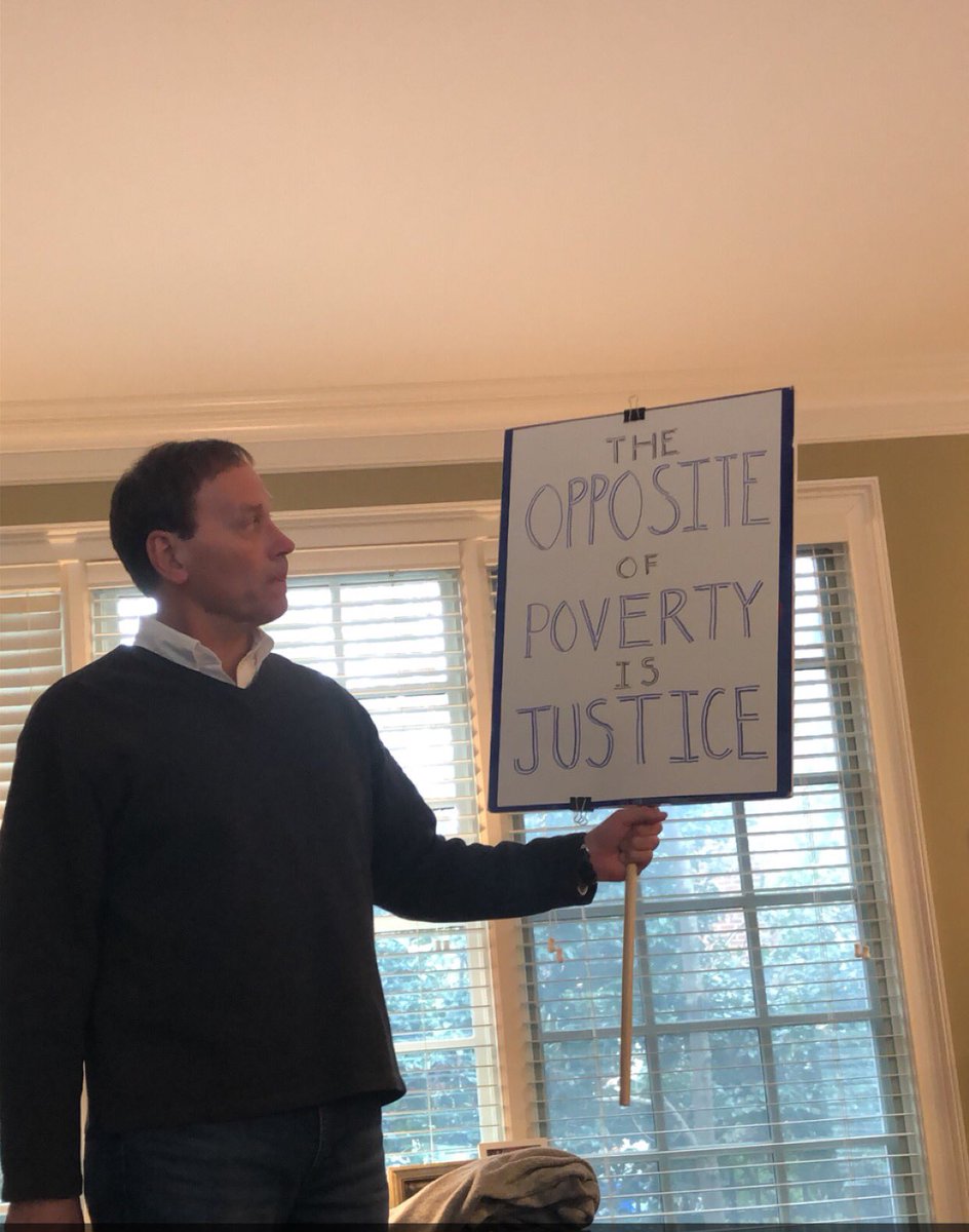 gracievdaniel's tweet photo. still my all-time favorite dude. marching with the best sign in his white coat with other doctors today. please zoom in on pic 3 to see “stop defending your racism as patriotism” 👏#doctorsagainstTrump #healthoverprofit https://t.co/2Mw1cEHOIl
