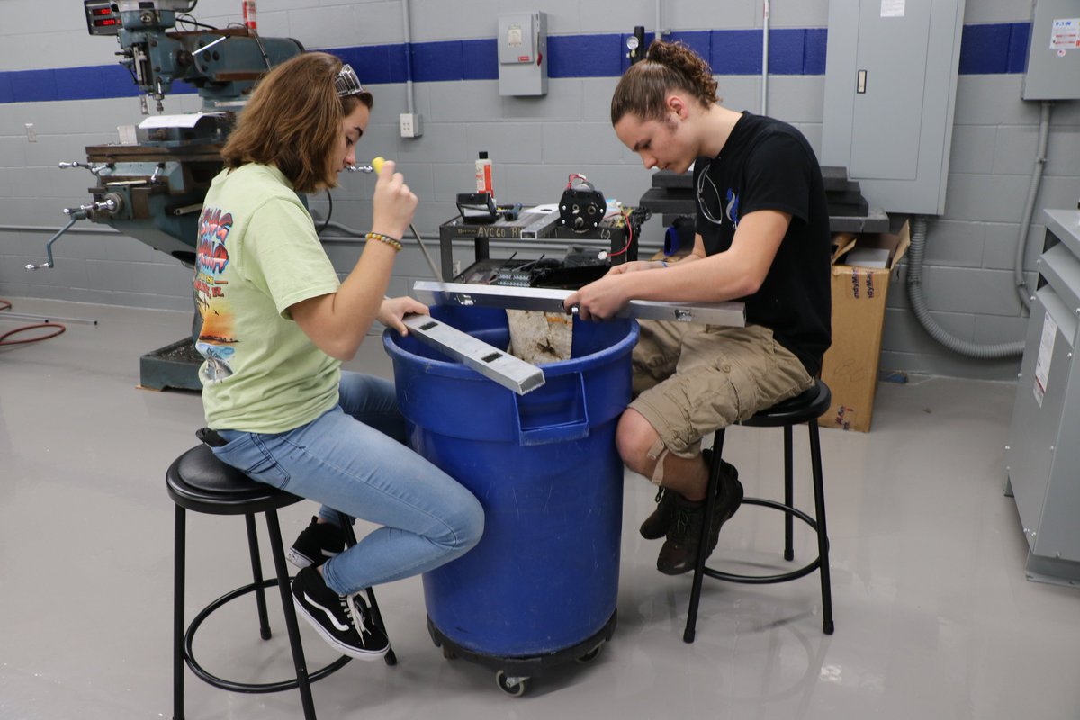 Suzanne and Michaela are working on finding sponsorship's. Issac and Peyton are filing the areas where the gear box's/wheels will go.