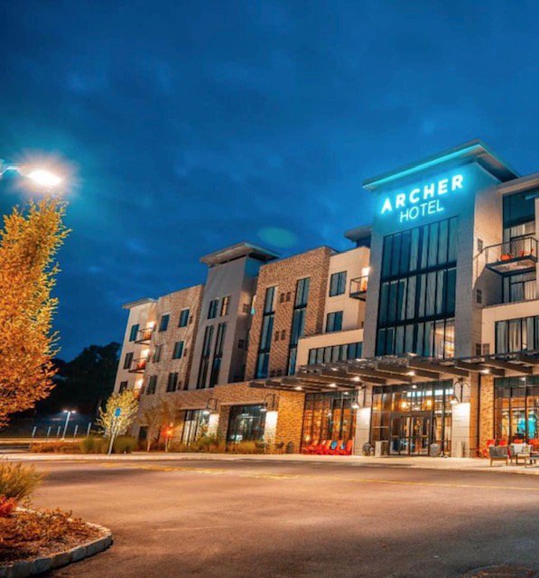 vccusa's tweet image. Beautiful nighttime view of @LodgeWorks's @ArcherHotel in Florham Park, NJ, which we finished last May. This 161 room boutique hotel has an industrial chic style with amenities such as an indoor pool, cocktail bar with outdoor patio and bocce ball court! #VCCusa #boutiquehotel