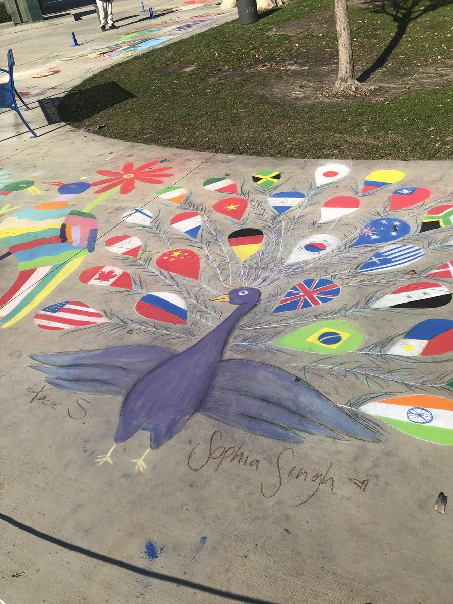 MrsMunesato's tweet photo. A couple of the Chalk Art pieces for International Week! #LikeAPio #chalkart #internationalweek #whspios https://t.co/oWk7JNSqAG