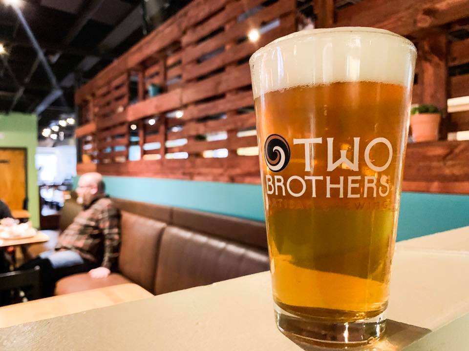 TwoBrothersBeer's tweet photo. We’re back in business at the #TwoBrosTapHouse and we have a lot going on. Our freshly tapped Totally Jawsome Hazy IPA is now available, as well as Cajun food specials all month long. Come on out, we’ve missed you guys! https://t.co/8TYzJOqHVp