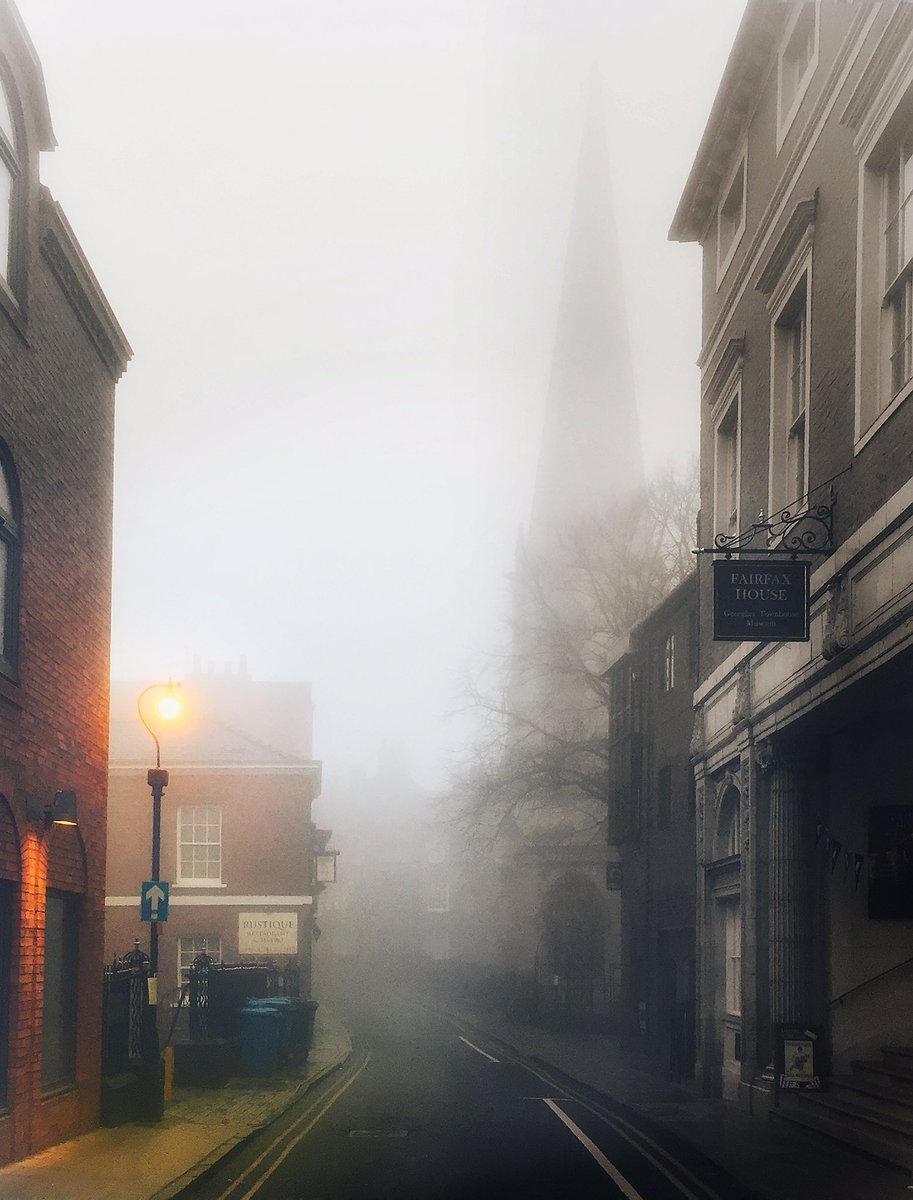 yorkxplorer's tweet image. Castlegate, York. Lamp glows warm, church spire looms, foggy morning. #york #foggy #castlegate #churchspire #Georgian