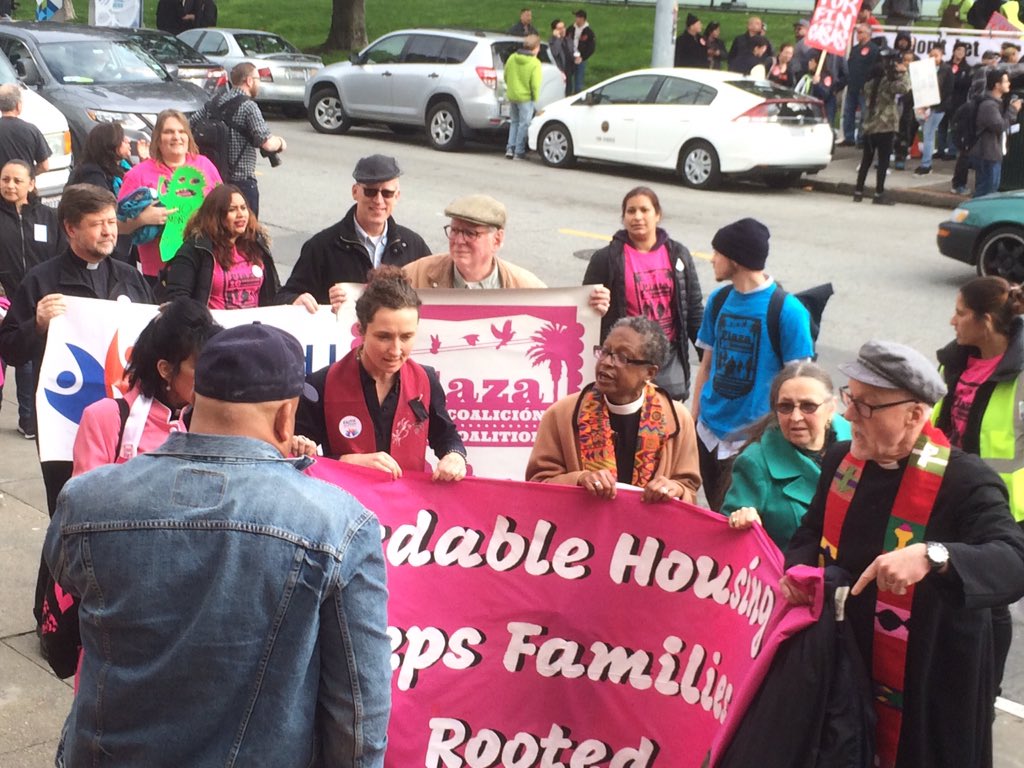 PlazaSixteen's tweet photo. Hundreds of community members follow Faith Leaders into the No Monster hearing at Mission High. #BuildTheMarvel https://t.co/NPF1LxXPgd