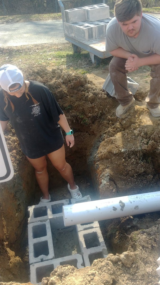 2019_srhs's tweet photo. Masonry 2&amp;3 getting some real world experience in the ditches. They have poured concrete, and now laying the block great job y'all. She even got her shoes muddy. #rss_cte #rssctemonth https://t.co/aiDVeaGBOl