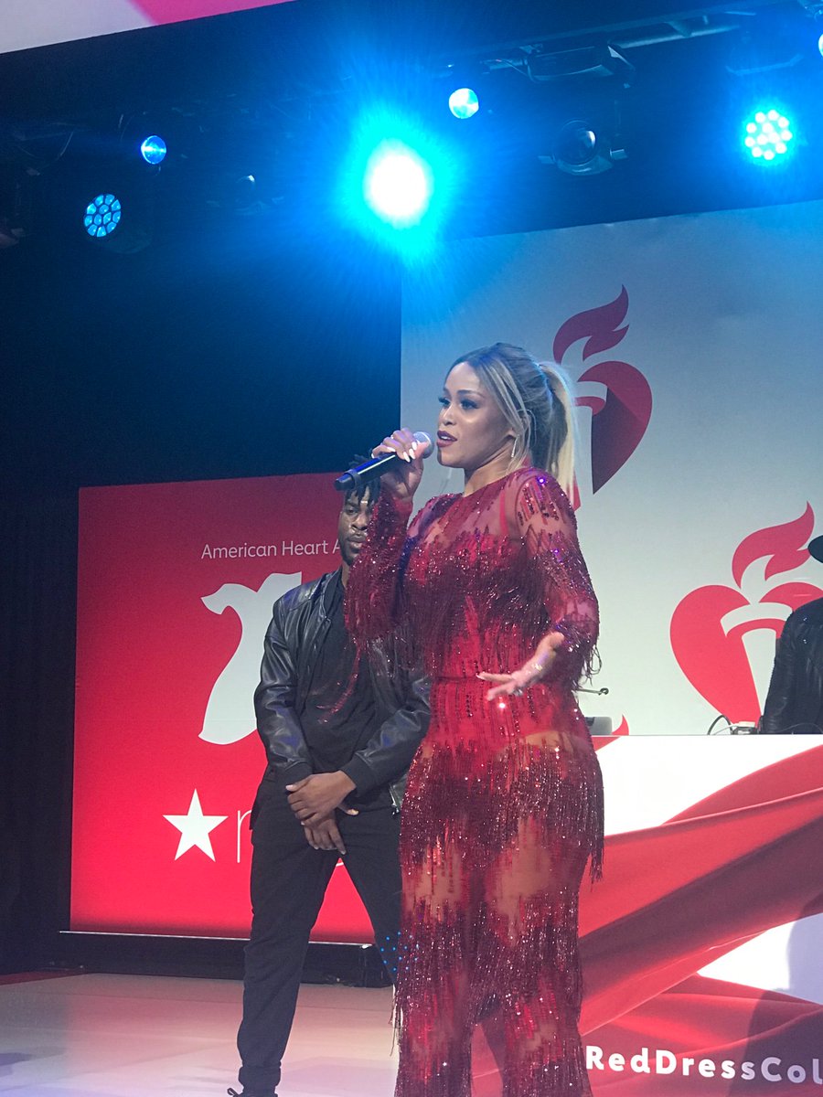 HHS_HealthReg2's tweet photo. Who’s that girl? Rapper @TheRealEve joined other women in taking charge of their health at the @GoRedForWomen #RedDressCollection with @nih_nhlbi #OurHearts. 80% of cardiac events can be prevented with education and lifestyle changes. #HeartMonth https://t.co/TguvwK69ac