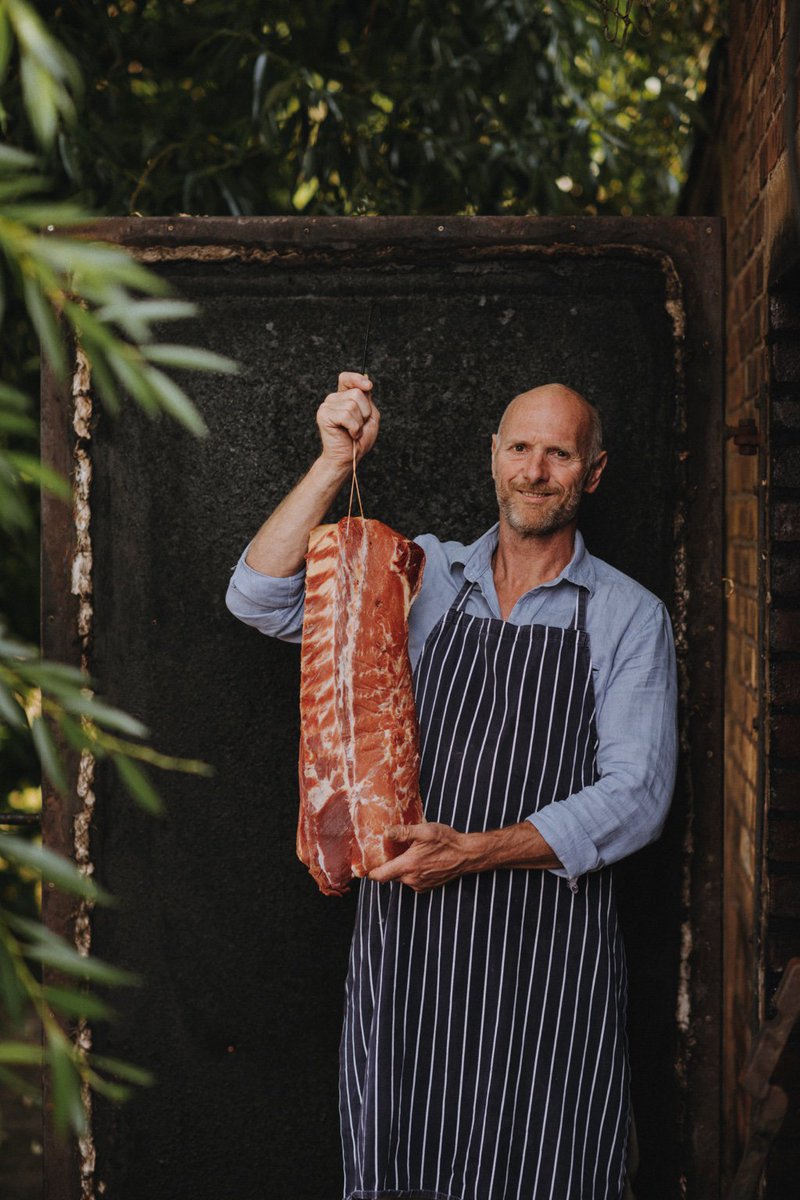 Rob and a flitch of oak smoked bacon.
