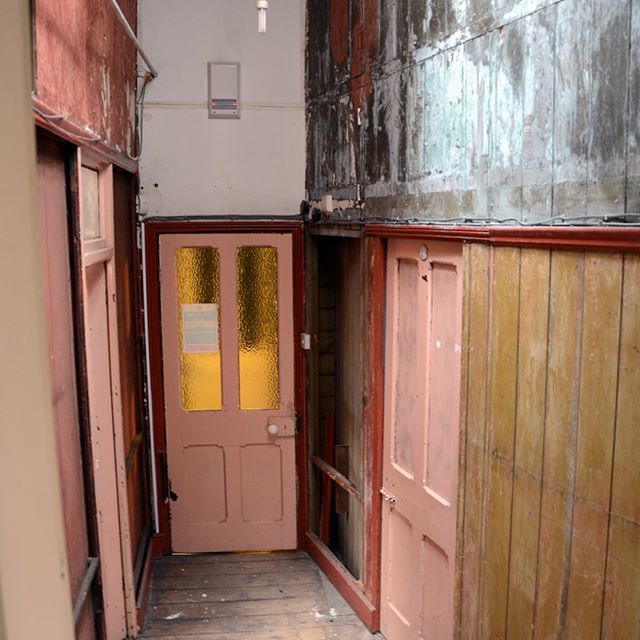 WWWinterLtd's tweet photo. Stripping back the layers - the back corridor is looking increasingly Dickensian! #heritage #wwwinter #MidlandRoadDerby #restoration #archeology #Victorianphotostudio https://t.co/DknxkZxnTW https://t.co/syE71jXhDJ