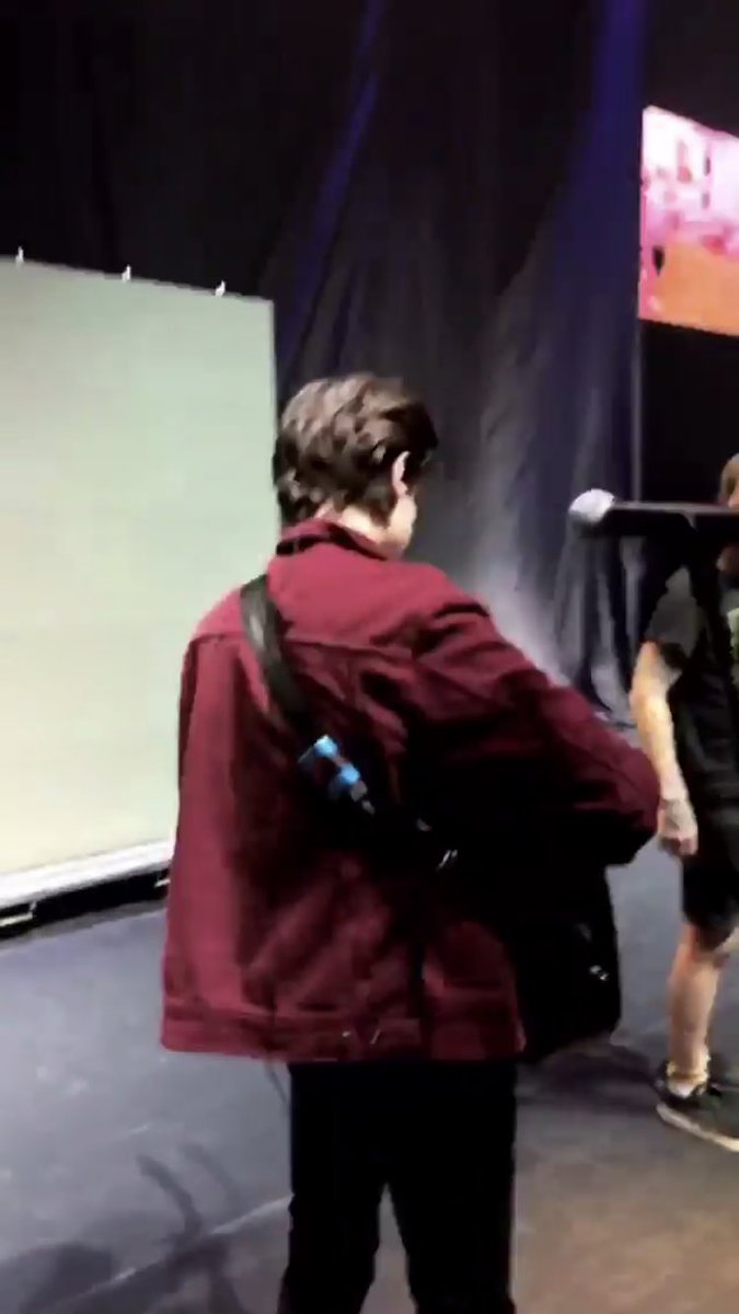blake wearing his best piece of clothing: his maroon jacket .