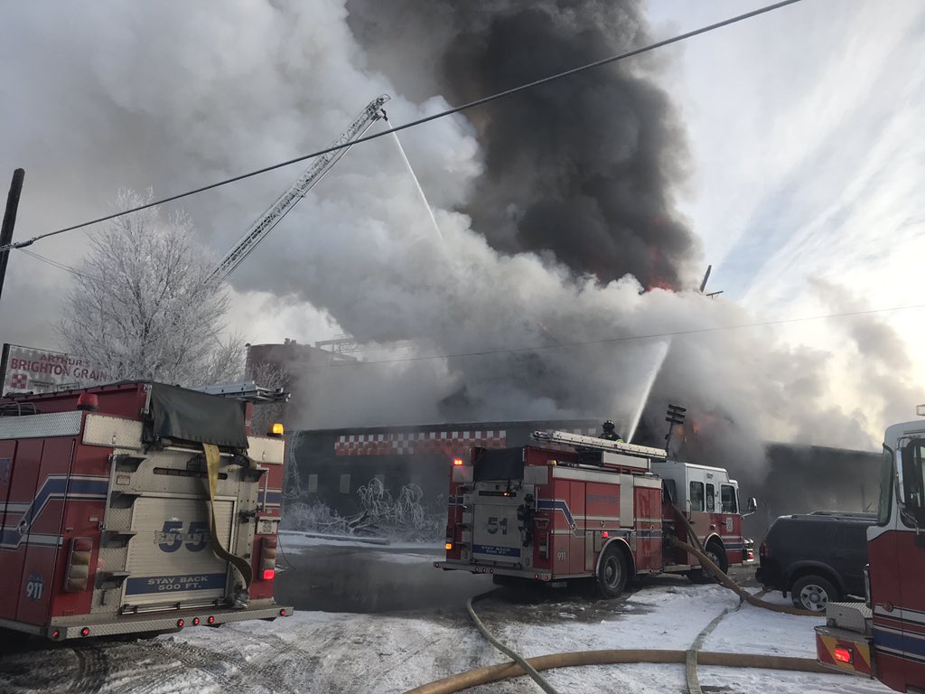 Aerial operations at Main and Denver.  Vacant building.