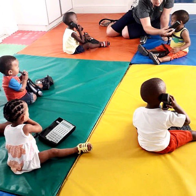 acresoflove's tweet photo. Cuteness overload! Our toddlers began learning about #phones in #ClamberClub this week. We love helping them explore their world &amp; gain new skills. https://t.co/Xdqh8fBfPL