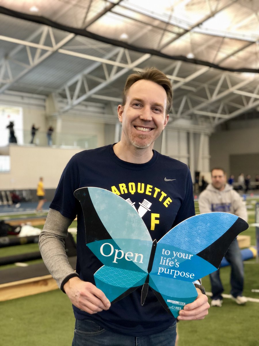 MarquetteToday's tweet photo. Coach Rogers and @MUTFXC showing that #MissionWeek2019 doesn’t stop, even when you’re 265 miles away at a track meet. 🦋🏃♀️🏃♂️ https://t.co/Ewd60BiyR6