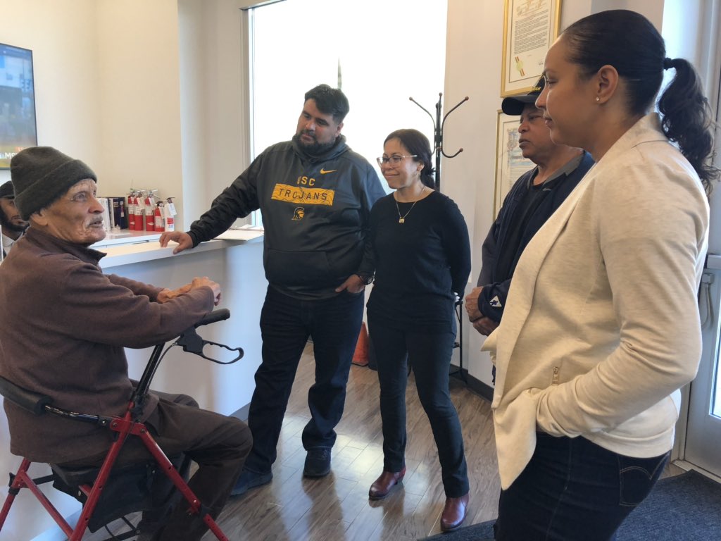 CoCoSouthLA's tweet photo. One of our veteran members, Mr. Williams, stopped by to pay his membership dues today. Coincidentally, our founder @RepKarenBass appeared in the background on @MSNBC. This is what standing on the shoulders of giants looks like. #PeoplePowerProgress #FridayFeeling https://t.co/6HigzDvZXC