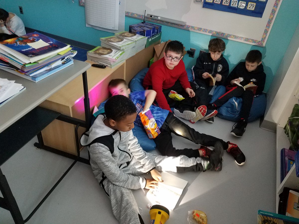 erin_hric's tweet photo. Flashlight reading party! These kids deserve a reward for following the 3 B's every day. I am #MontourProud  of them. https://t.co/H7OucEos2d