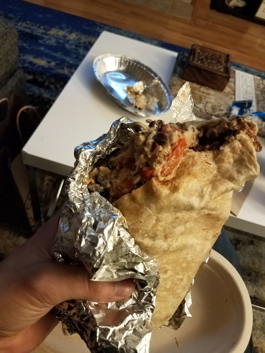 DevinTweetsOnU's tweet photo. Why does @ChipotleTweets offer extra portions if they're just gonna stuff it so full they cant wrap it? Lol. This was a struggle https://t.co/7qgCbwb2t7