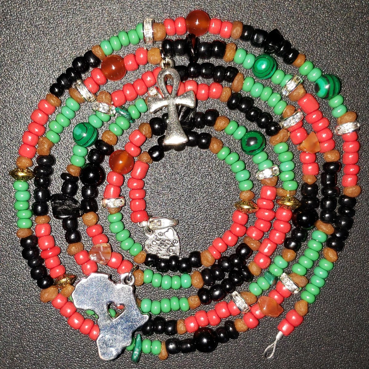NubiaTouch's tweet photo. Part 3 in my 3 part #RBG waistbead series! I purposely made them similar as was my client's pleasure๐ป Couldn't post this last one until shipment was received due to the surprises I included ๐น #carnelian #blacktourmaline #redonyx #malachite #touchofnubiaโค๐ค๐ #MadeWithLove๐ฝ https://t.co/aFgfgVcnp7