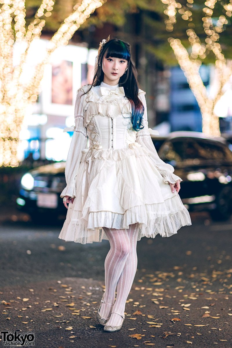 lolit-model Tokyo-based fashion model @RinRin_Doll on the street  in Harajuku wearing an Angelic Pretty lolita dress with a Sweet Mildred  corset and Sweet Mildred starfish headpiece, Emily Temple shoes,