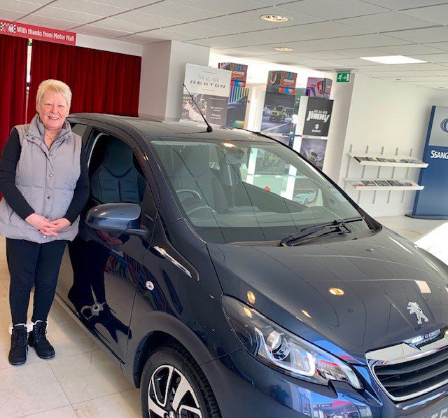 MotorMallGuern's tweet photo. Here is customer Wendy Page just about to leave the Motor Mall Guernsey showroom with her new Peugeot 108 Allure. 

We thank Wendy for her custom and wish her many happy miles in her new car. #Happyhandover. https://t.co/MEFmOusOYP
