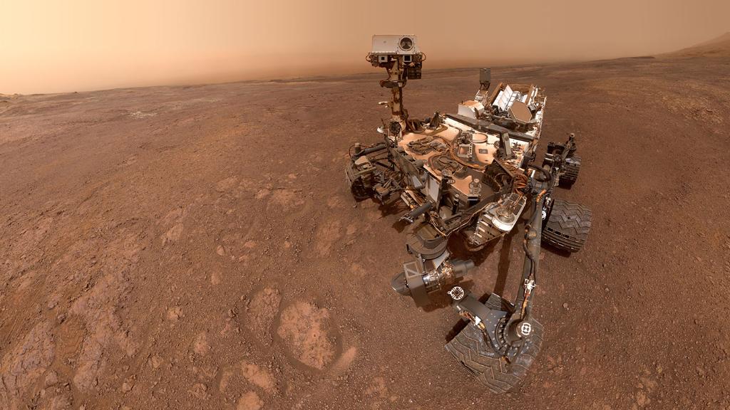 NASA's tweet photo. 📍 Vera Rubin Ridge, Mars
Our @MarsCuriosity rover took one last selfie 📸 before waving goodbye to Vera Rubin Ridge, its home since Sept. 2017. Now, the rover descends to the next site: a clay region of Mount Sharp just south of the ridge. Look closer: https://t.co/gEs2OLEIaB https://t.co/Lu282k4Xh0