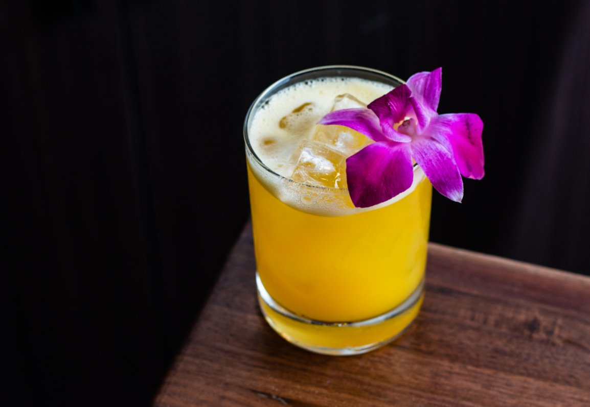 SecretoKitchen's tweet photo. How's this for some #MondayMotivation! Feast your eyes on the Southern Passion featuring vodka, orange liqueur, falernum, passion fruit, agave and lime! 🍊 😍 💜 https://t.co/u4AswwG7Y1