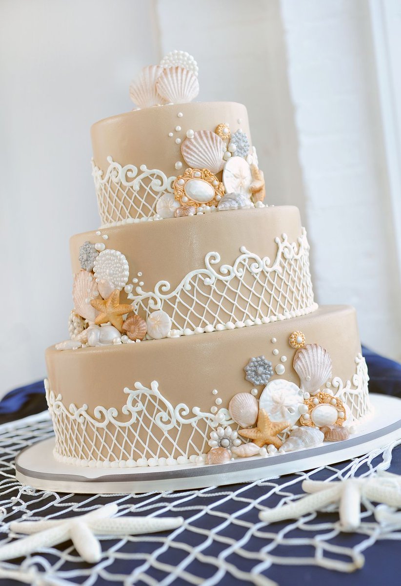 eatwicked's tweet photo. This tan and Ivory sea shell cake has long been a favorite. In fact we've made a version of this every year for the past 5 years! 
https://t.co/iYUzmYLApW
#eatwicked #nauticalwedding #weddingcake #sindesserts #fondant #throwbackwedding #seashellweddingcake https://t.co/si7D1DZGbx