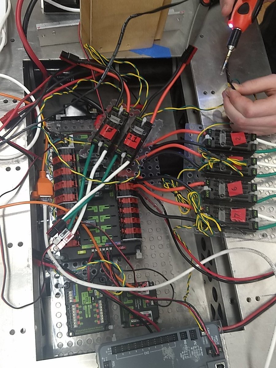 Head programmers working hard at teaching this year's freshman.

Yes that is a sautering iron. They are adaptable.