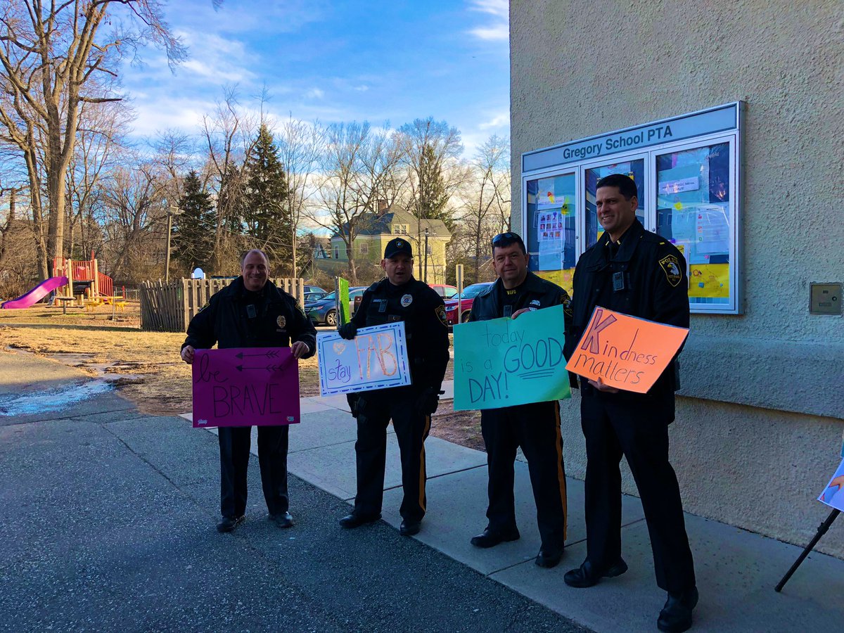 C_Portuese's tweet photo. What a treat to have @LizzPicini and members of #WOPD join the Gregory Staff in welcoming our students this morning. Such a fun way to start a Monday! 🕊😊🦅#greatkindnesschallenge #gregoryschoolrocks #wo2world @woschools @GregoryCounsels https://t.co/60tIAfCmNq