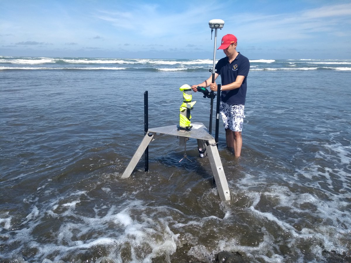 UoP_CMAR's tweet photo. Day one of rip current experiment at Muriwai, NZ. Plenty of waves, sun and kit. Great to be working with @CoastalScoop @slsnz @slsnr1 https://t.co/uNdX1KWRgI