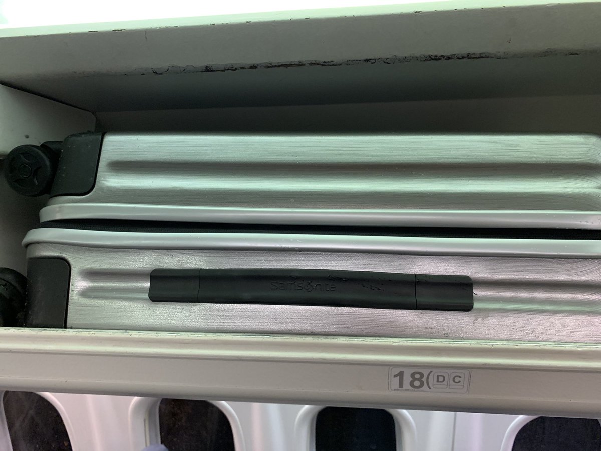 gazzetaGP's tweet photo. @flybe so you guys just charged £50! to take my bag to London.  It doesn’t fit the cage at check in but as you can see fits the locker on the plane (with room to spare) ? Why do this? at least size the cage to be same size or bigger!!  What’s the refund process please? https://t.co/ieN1xoPuEr